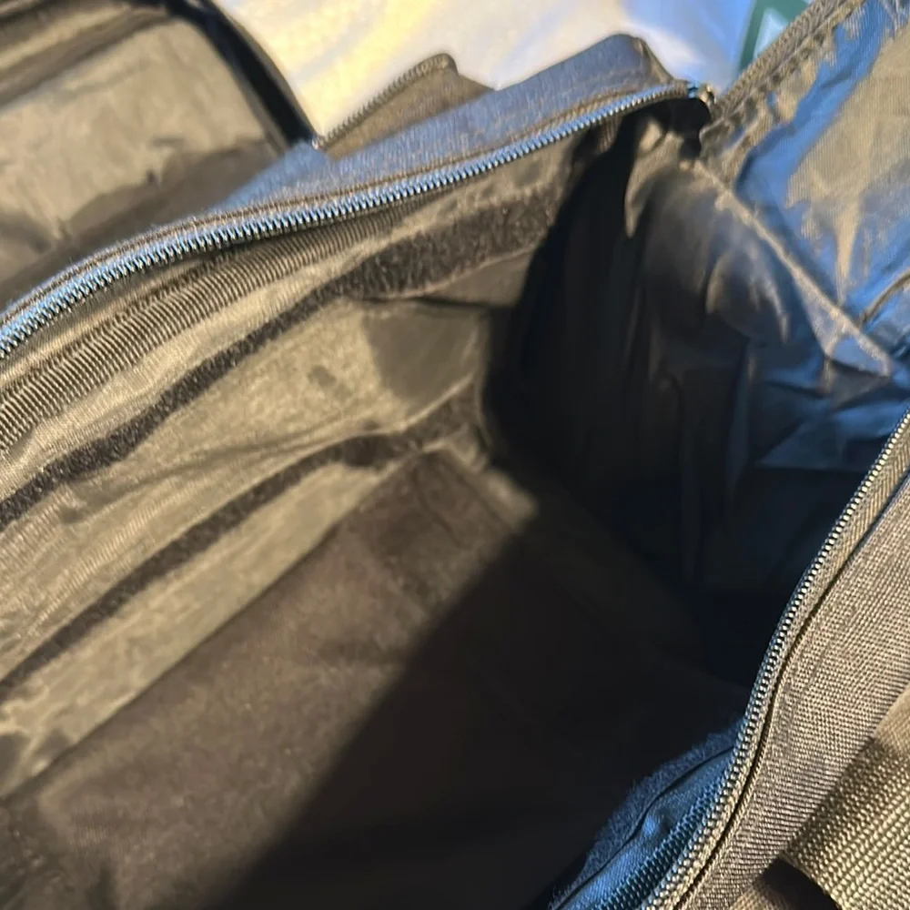 Black Duffel Bag with Rigid Structure and Durable Fabric
